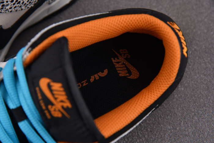 Nike SB Dunk Low Olympics Safari FZ1233-002